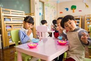 KIds in Daycare Eating Snack