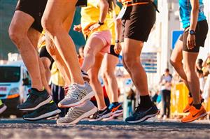 Runners racing with focus on feet
